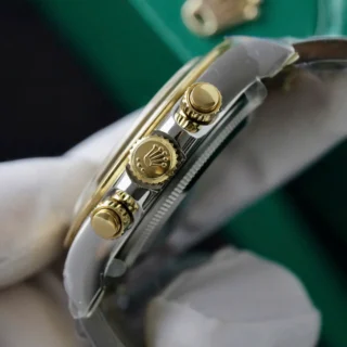 Replica Rolex Daytona Black Dial Gold Bezel Two Tone Oyster Bracelet