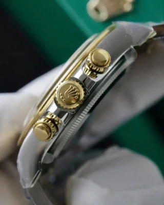 Replica Rolex Daytona Black Dial Gold Bezel Two Tone Oyster Bracelet