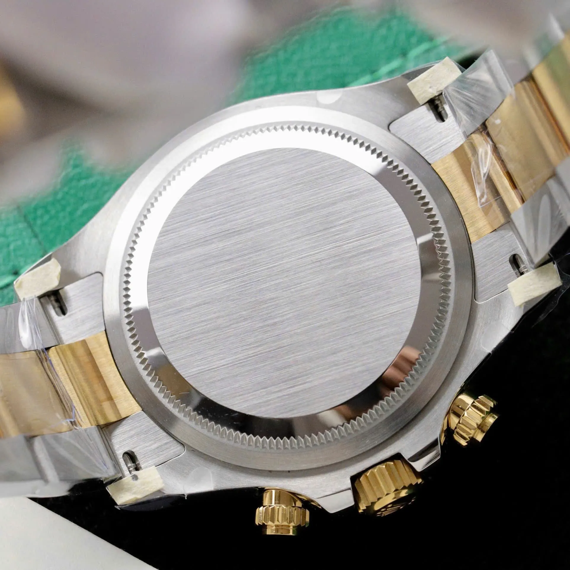 Replica Rolex Daytona Black Dial Gold Bezel Two Tone Oyster Bracelet