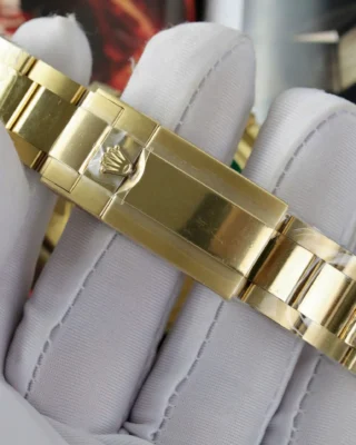 Replica Rolex Daytona Black Dial Gold Bezel Gold Case Oyster Bracelet