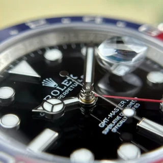 Replica Rolex GMT Master Pepsi Black Dial Blue and Red Bezel Oyster Bracelet