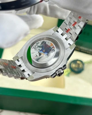 Replica Rolex GMT Master II Batgirl Black Dial Black Blue Bezel Jubilee Bracelet