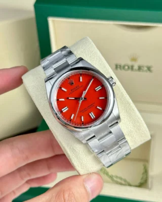 Replica Rolex Oyster Perpetual Coral Dial Smooth Bezel Oyster Bracelet
