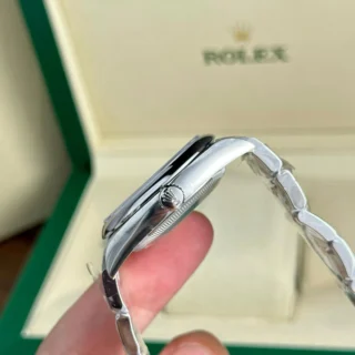 Replica Rolex Oyster Perpetual Coral Dial Smooth Bezel Oyster Bracelet