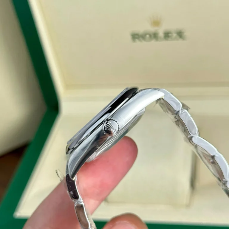 Replica Rolex Oyster Perpetual Coral Dial Smooth Bezel Oyster Bracelet