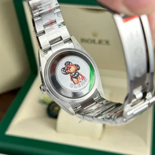 Replica Rolex Oyster Perpetual Coral Dial Smooth Bezel Oyster Bracelet