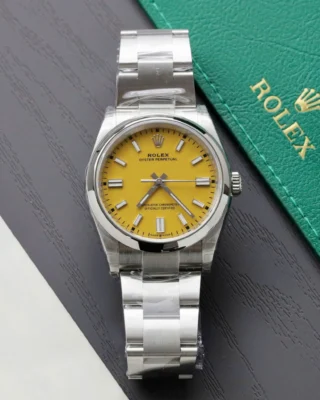 Replica Rolex Oyster Perpetual Yellow Dial Smooth Bezel Oyster Bracelet