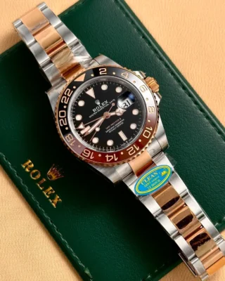 Replica Rolex GMT Master II Root Beer Black Dial rose Gold Two Tone Oyster Bracelet