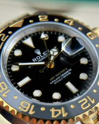 Replica Rolex GMT Master II Zombie Black Dial Black and Gray Bezel Two Toned Jubilee Bracelet