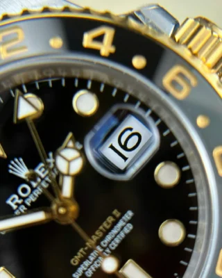 Replica Rolex GMT Master II Zombie Black Dial Black and Gray Bezel Two Toned Jubilee Bracelet