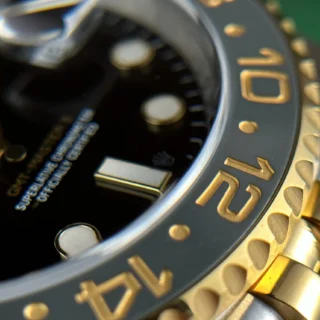 Replica Rolex GMT Master II Zombie Black Dial Black and Gray Bezel Two Toned Jubilee Bracelet
