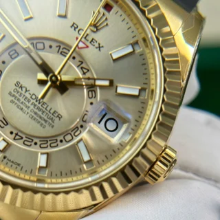 Replica Rolex Sky-Dweller Champagne Dial Gold Case Oysterflex Bracelet