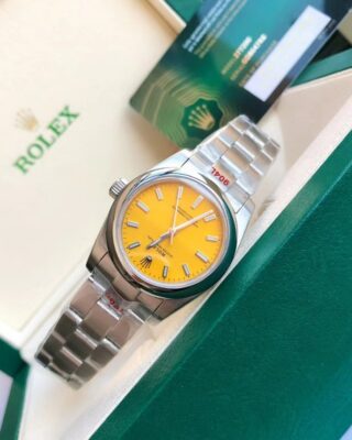 Replica Rolex Oyster Perpetual SS/SS Yellow/Stk Feature Highlight