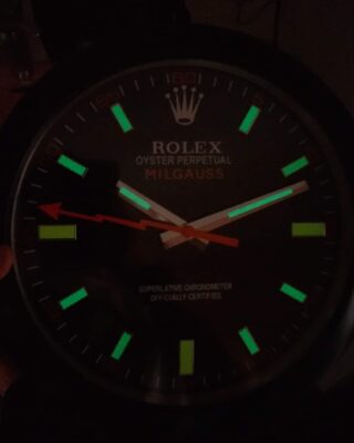 Replica ROLEX WALL CLOCK – MILGAUSS BLACK/ORANGE Close-Up Focus