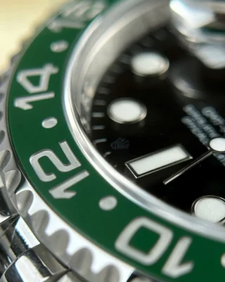 Replica Rolex GMT Master Sprite Black Dial Green and clack Bezel Jubilee Bracelet