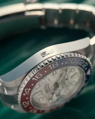 Replica Rolex GMT Master II Superman Meteorite Dial Blue Red Bezel