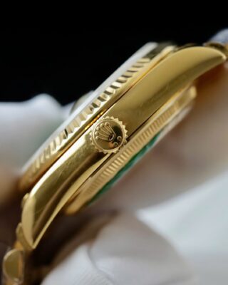 Replica Rolex Day-Date Fluted Bezel Green Dial Presidential Bracelet on white glove
