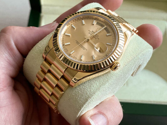 Click to view full screen Rolex Day-Date II Champagne Dial 228238 40 mm photo review