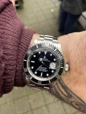 Click to view full screen Rolex Submariner Black Dial 116610LN photo review
