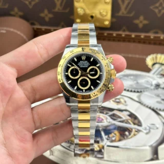Replica Rolex Daytona Black Dial Gold Bezel Two Tone Oyster Bracelet