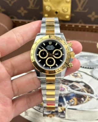 Replica Rolex Daytona Black Dial Gold Bezel Two Tone Oyster Bracelet