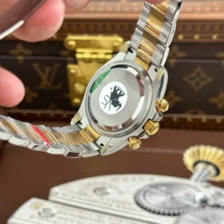 Replica Rolex Daytona Black Dial Gold Bezel Two Tone Oyster Bracelet