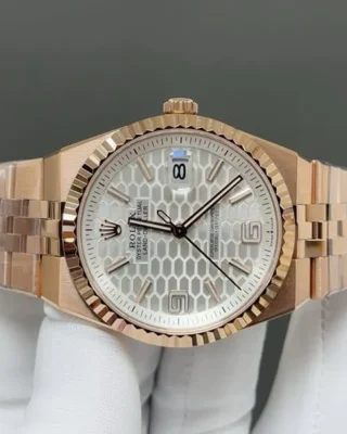 Replica Rolex Land-Dweller 40 mm Everose gold Angle Detail