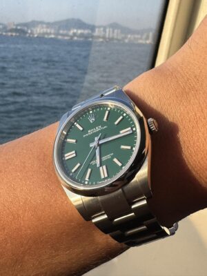 Green Dial Replica Rolex Oyster Perpetual on wrist