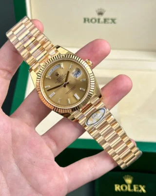 Replica Rolex Day-Date Champagne Dial Fluted Bezel Gold Presidential Bracelet