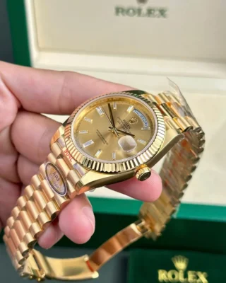 Replica Rolex Day-Date Champagne Dial Fluted Bezel Gold Presidential Bracelet