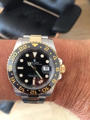 Click to view full screen Rolex GMT-Master II Black Dial 116713 photo review