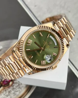 Replica Rolex Day-Date. Olive Dial Fluted Bezel Rose Gold Presidential Bracelet