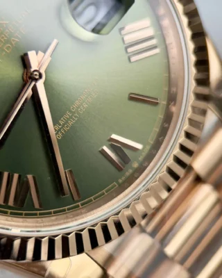 Replica Rolex Day-Date. Olive Dial Fluted Bezel Rose Gold Presidential Bracelet
