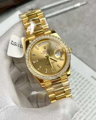 Replica Rolex Day-Date Champagne Dial Diamond Bezel Gold Presidential Dial