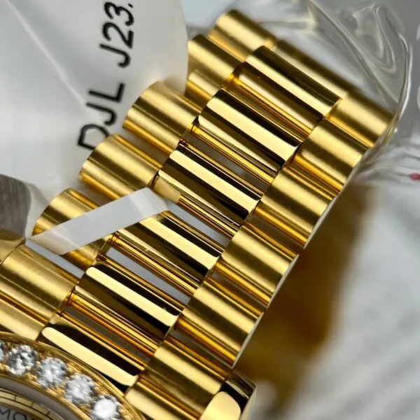 Replica Rolex Day-Date Champagne Dial Diamond Bezel Gold Presidential Dial