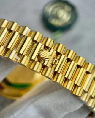 Replica Rolex Day-Date Champagne Dial Diamond Bezel Gold Presidential Dial