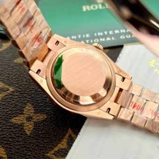 Replica Rolex Day Date Rose Gold Dial Fluted Bezel Presidential Bracelet