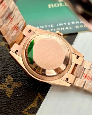 Replica Rolex Day Date Rose Gold Dial Fluted Bezel Presidential Bracelet