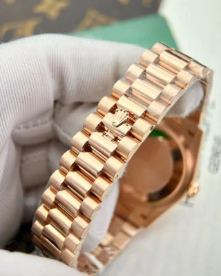 Replica Rolex Day Date Rose Gold Dial Fluted Bezel Presidential Bracelet