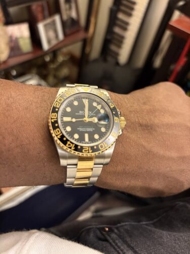 Click to view full screen Rolex GMT-Master II Black Dial 116713 photo review