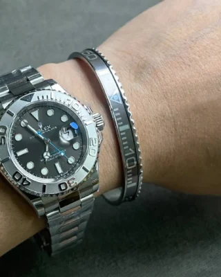 Close-up of Yacht-Master Rhodium Dial 126622 watch with elegant silver dial on a man's wrist, premium titanium steel bracelet