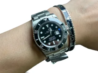 Submariner Titanium Steel Bracelet on wrist with black Rolex Submariner watch