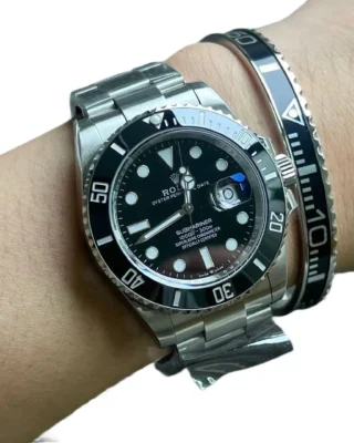 Submariner Titanium Steel Bracelet on wrist with black Rolex Submariner watch