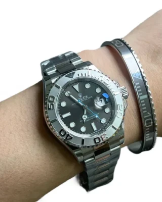 Silver Yacht-Master Titanium Steel Bracelet on wrist with Rolex Yacht-Master watch