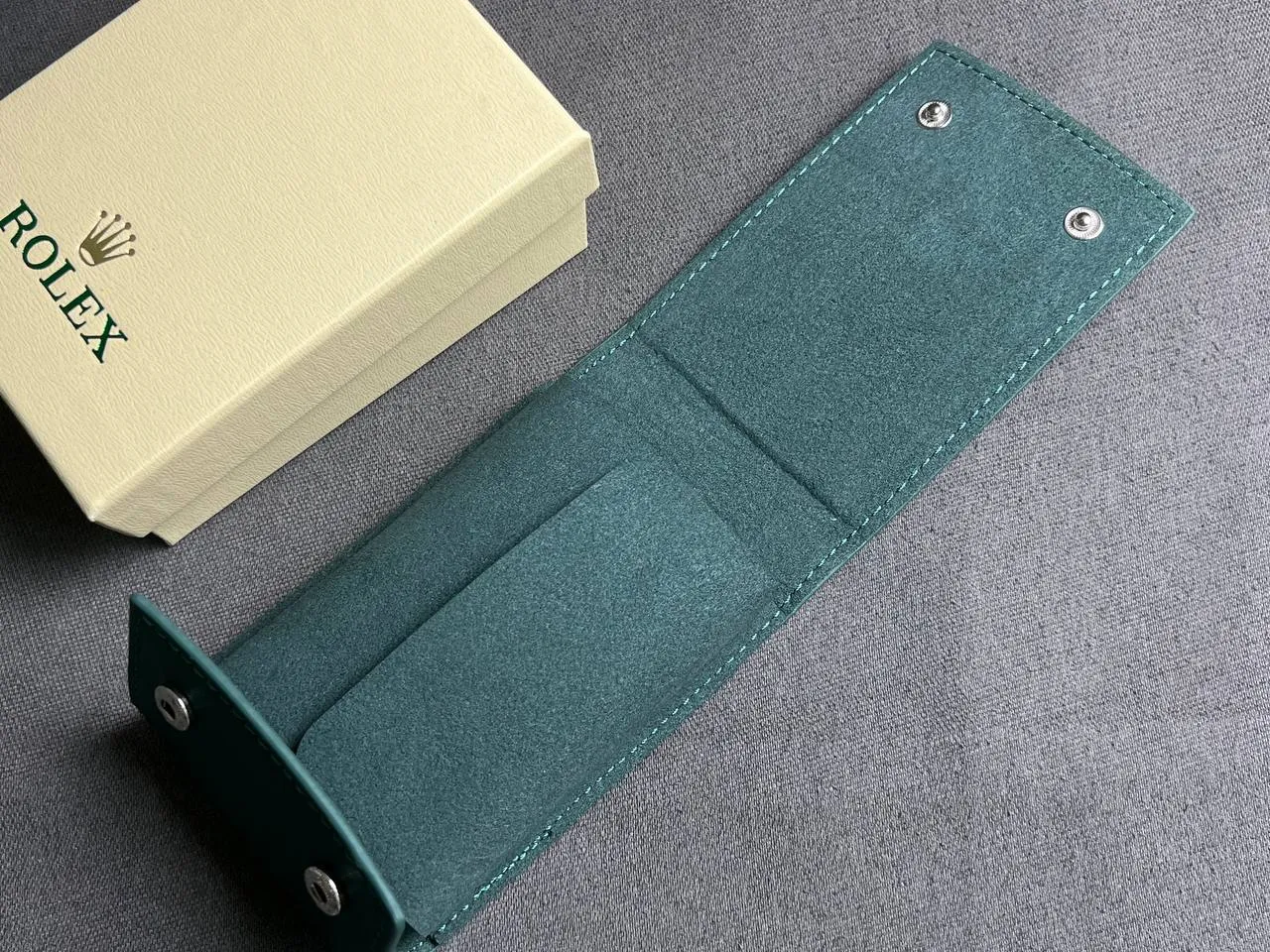 Open Replica Rolex Green Watch Roll Pouch – High-quality stitching and secure metal snaps