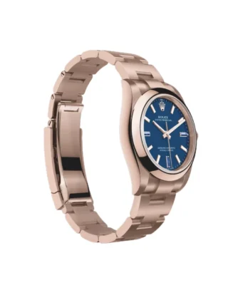 Rolex Oyster Perpetual Solid Gold 34mm Everose Gold (2026) — 18k Everose gold, blue dial with natural stone markers — angled view highlighting bezel and dial