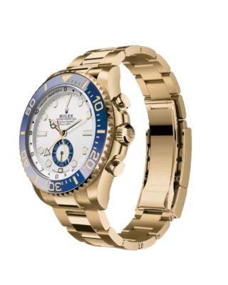 Rolex Yacht‑Master II Yellow Gold 44mm (2026 Refresh) — 18k yellow gold, matte white dial with blue Cerachrom bezel — angled view with open clasp and bracelet