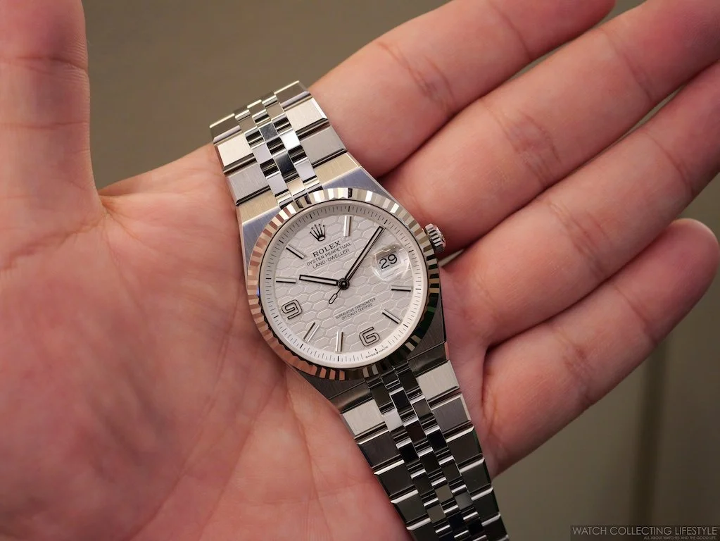 Rolex Land-Dweller 40mm Oystersteel Ref. 127334 on integrated Flat Jubilee bracelet