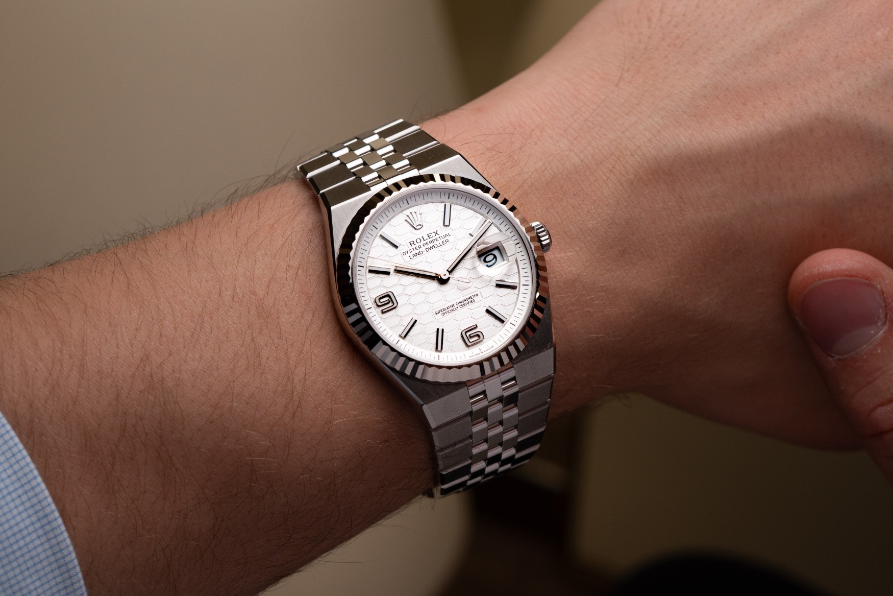 Rolex Land-Dweller 40mm White Rolesor on wrist showing integrated bracelet comfort